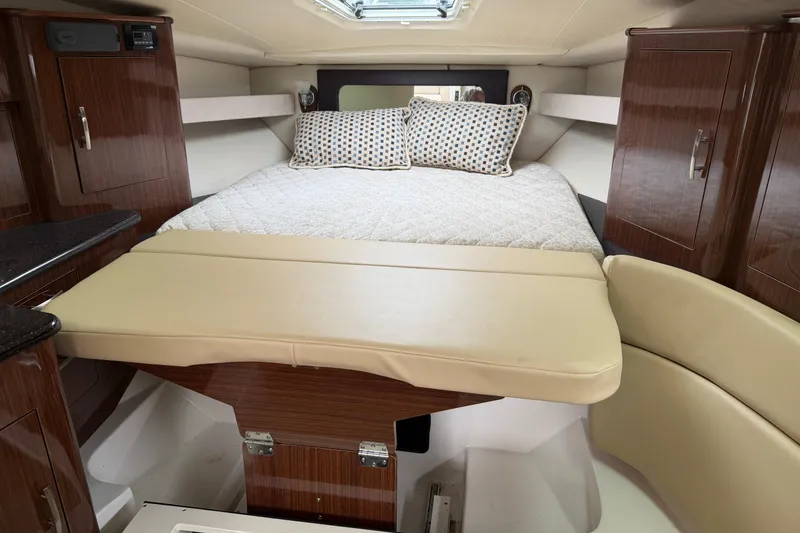 Slide: The Image of Interior cockpit of 2014 Regal 35 Sport Coupe with steering wheel and control panel. - 7