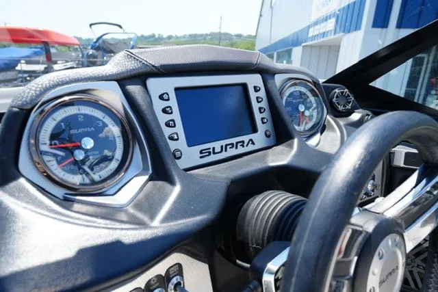 Slide: The Image of 2016 Supra SA400-550 dashboard with gauges and digital display. - 12