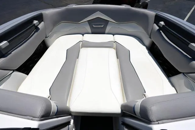 Slide: The Image of 2016 Supra SA400-550 boat interior with gray and white seating. - 6