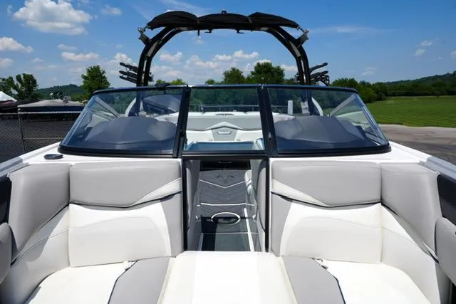 Slide: The Image of 2016 Supra SA400-550 boat interior with sleek seating and modern design. - 8