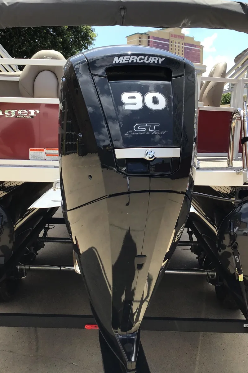 Slide: The Image of 2024 Ranger Reata 200F with Mercury 90 GT outboard motor, rear view. - 3