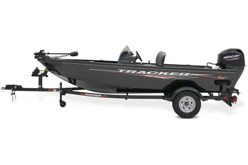 Slide: The Image of 2025 Tracker Super Guide V-16 SC boat interior with dual gray seats and steering console. - 6