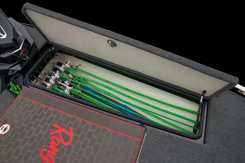 Slide: The Image of 2025 Ranger Z521R Cup-Equipped boat battery compartment with organized wiring and components. - 19