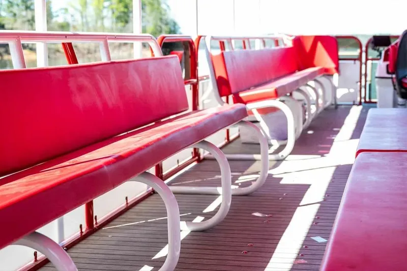 Slide: The Image of Red seating on 2024 Aloha Pontoon 50' Water Taxi, featuring spacious interior design. - 12