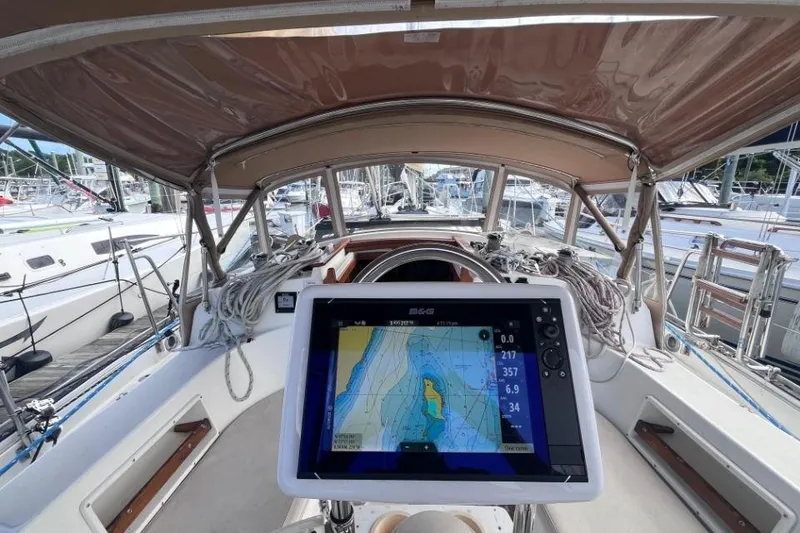 Slide: The Image of Cockpit of 2002 Pacific Seacraft 40 sailboat with navigation display and canopy. - 19