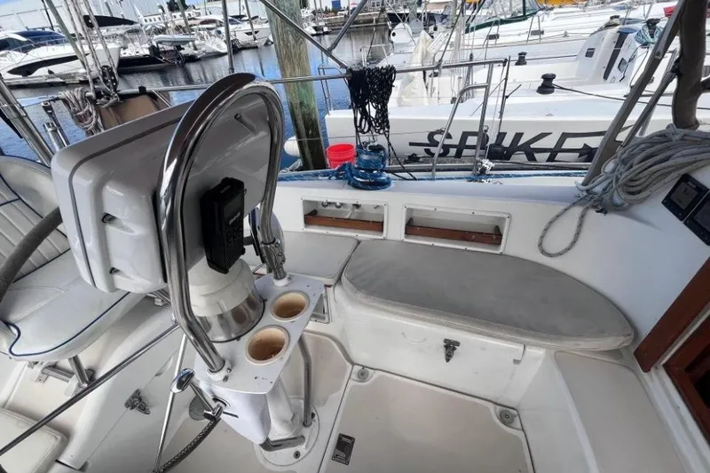 Slide: The Image of Cockpit of 2002 Pacific Seacraft 40 sailboat with steering wheel and seating area. - 20