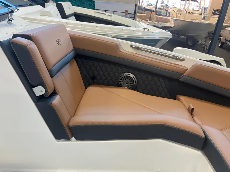 Slide: The Image of Luxurious seating in 2025 Cobalt R6 boat, featuring tan leather and modern design. - 19