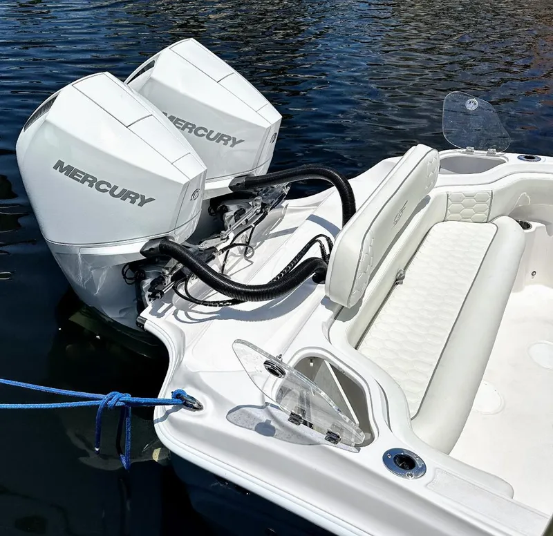 Slide: The Image of 2026 Glasstream 280 Pro-X boat with dual Mercury engines, white seating, and sleek design. - 5