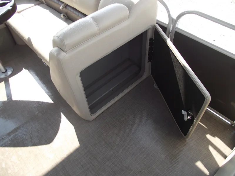 Slide: The Image of Open storage compartment on 2023 Sun Tracker Party Barge 20 DLX pontoon boat. - 17