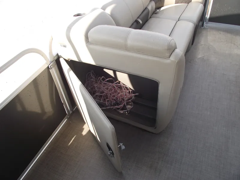 Slide: The Image of 2023 Sun Tracker Party Barge 20 DLX storage compartment with rope inside. - 19