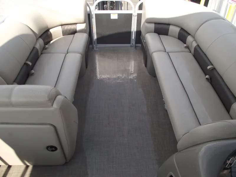 Slide: The Image of 2023 Sun Tracker Party Barge 20 DLX interior with spacious seating and modern design. - 7