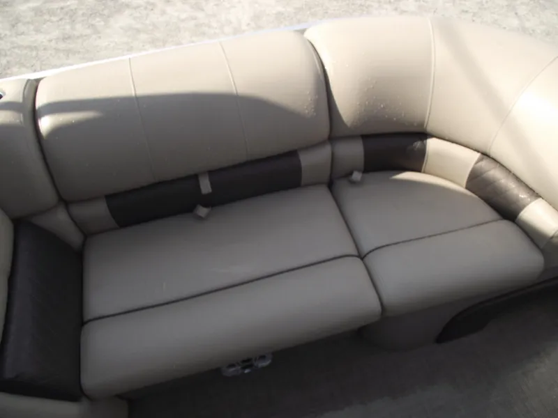 Slide: The Image of 2023 Sun Tracker Party Barge 20 DLX, beige and black seating detail. - 8
