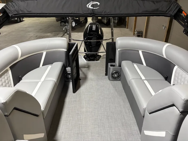 Slide: The Image of Interior of 2025 Crest 240 SLC boat with gray seating and modern design. - 10