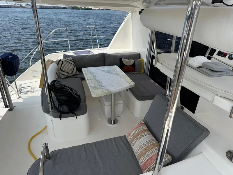 Slide: The Image of 2012 Leopard 39 Owner's Version yacht interior with cozy seating and nautical decor. - 17