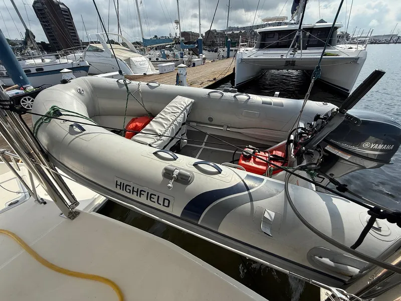 Slide: The Image of Inflatable Highfield boat with Yamaha motor docked near Leopard 39 yacht, 2012 model. - 19
