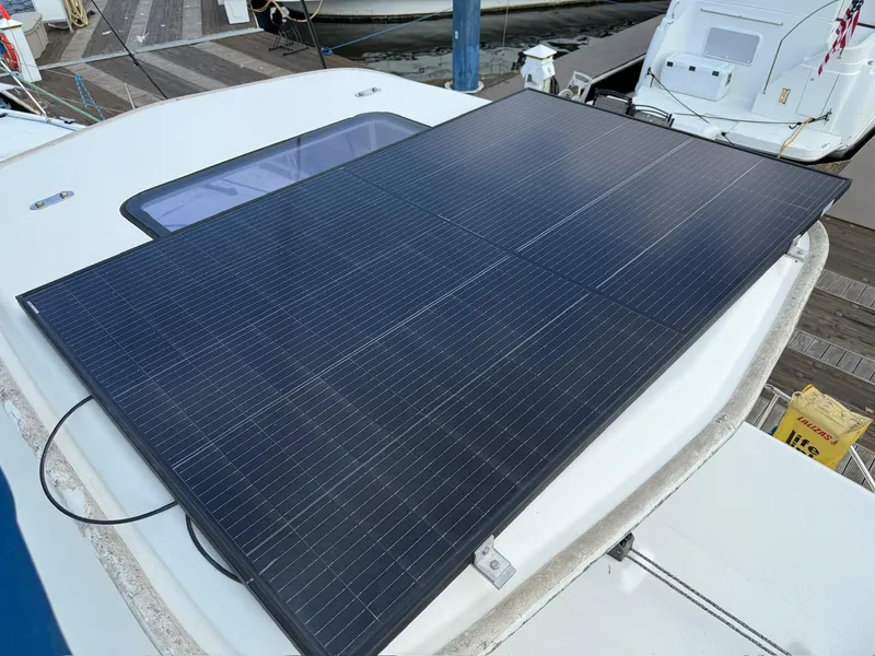 Slide: The Image of Solar panel on 2012 Leopard 39 Owner's Version catamaran at dock. - 21