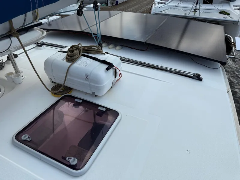 Slide: The Image of 2012 Leopard 39 Owner's Version yacht deck with solar panels and hatch. - 23