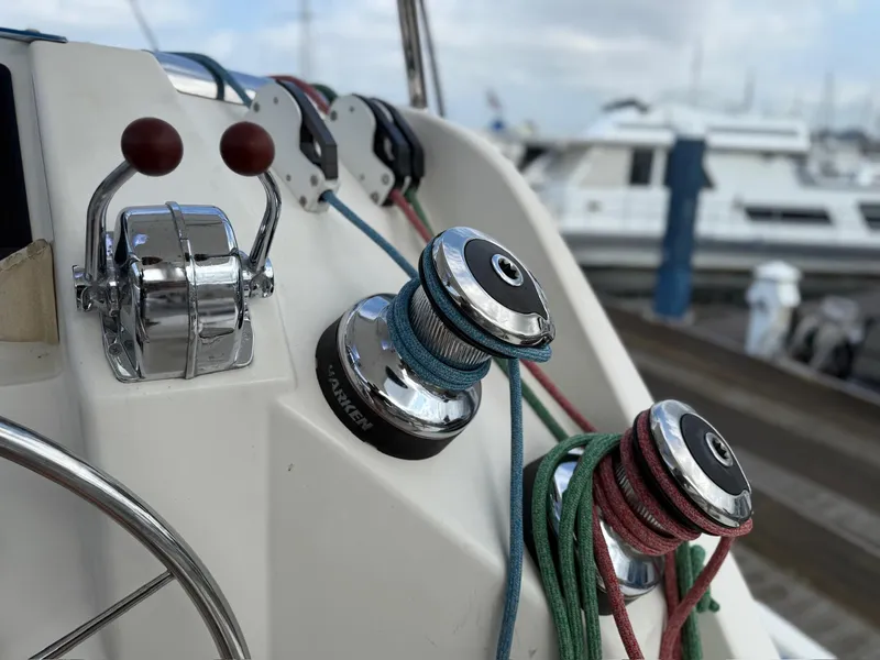 Slide: The Image of Sailboat controls and winches on a 2012 Leopard 39 Owner's Version yacht. - 30