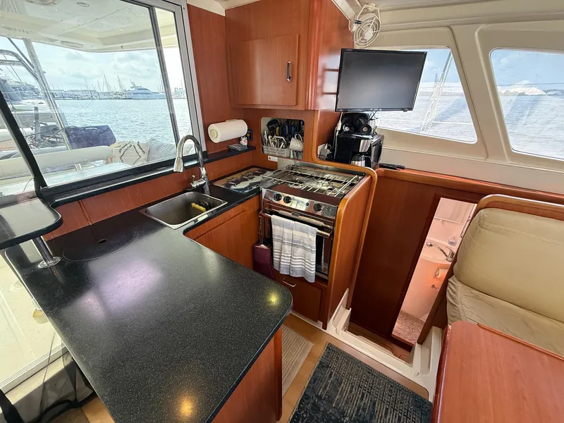 Slide: The Image of Interior of 2012 Leopard 39 Owner's Version yacht kitchen with modern amenities. - 36