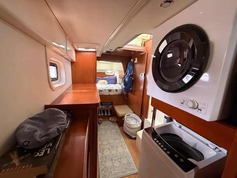 Slide: The Image of Interior of 2012 Leopard 39 yacht with laundry area and cozy cabin. - 42