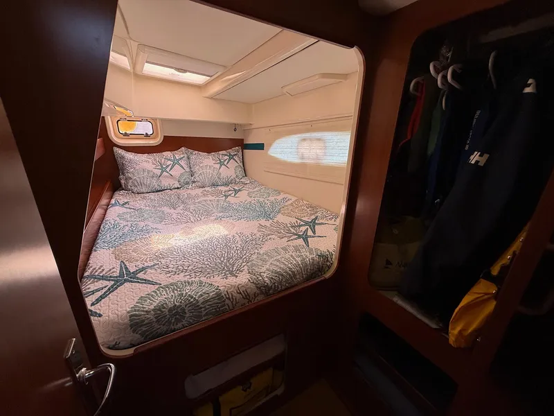 Slide: The Image of Cozy bedroom in 2012 Leopard 39 Owner's Version yacht with starfish-themed bedding. - 47