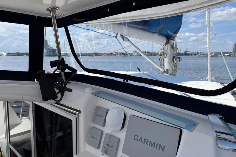 Slide: The Image of Cockpit view of 2012 Leopard 39 Owner's Version catamaran with Garmin navigation system. - 59