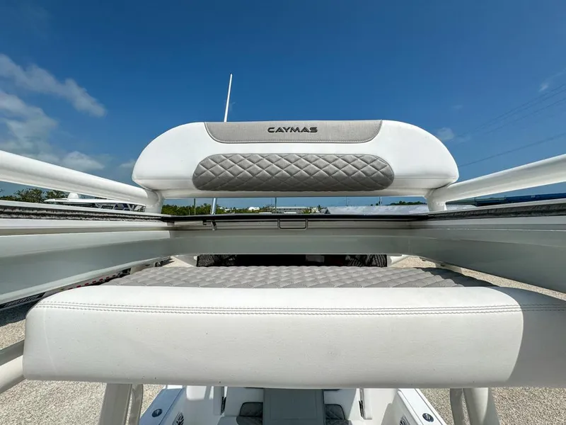 Slide: The Image of 2024 Caymas 28 HB boat seat with quilted design under clear blue sky. - 21