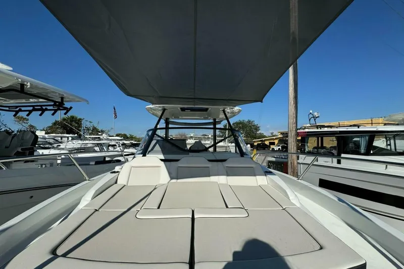 Slide: The Image of 2025 Jeanneau Leader 9.0 WA Series 2 boat with sunshade and spacious deck. - 8