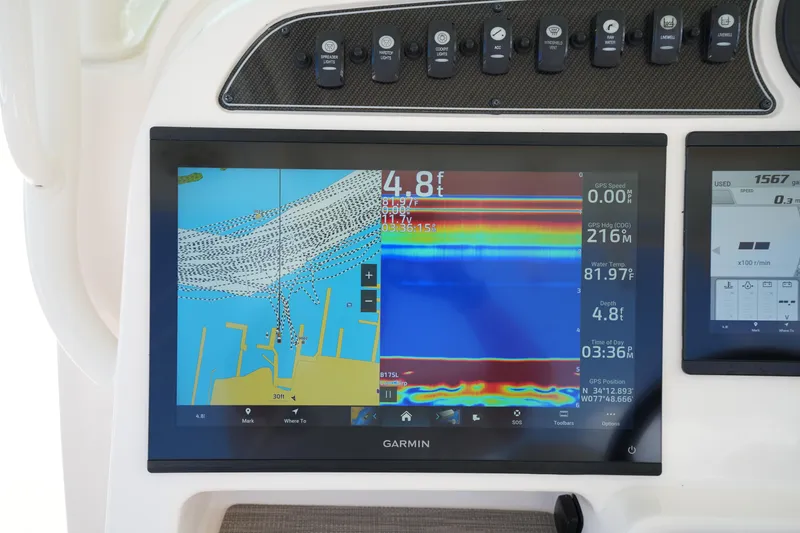 Slide: The Image of Garmin navigation display on 2024 Grady-White Canyon 336 boat dashboard. - 30
