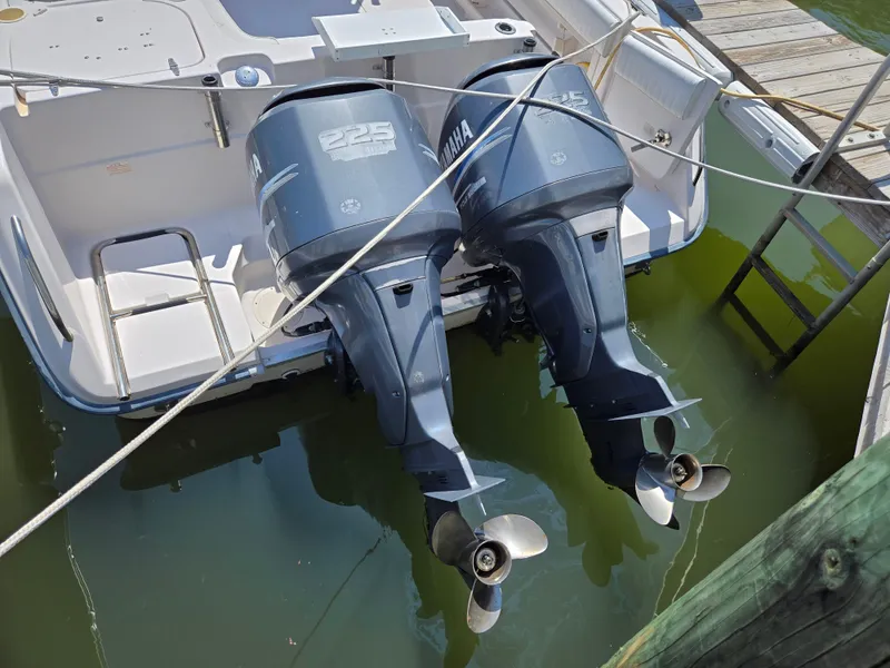 Slide: The Image of 2003 Grady-White Marlin 300 with twin Yamaha 225 outboard motors at dock. - 18