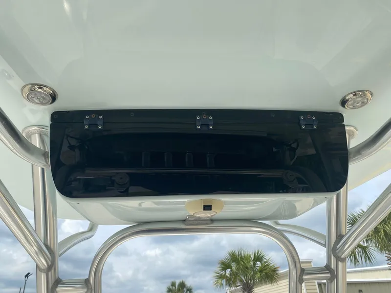 Slide: The Image of 2019 Key West 239 FS boat T-top with mounted electronics box and stainless steel frame. - 6