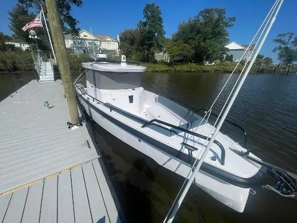 Slide: The Image of Axopar 28 CABIN 2024 - 6