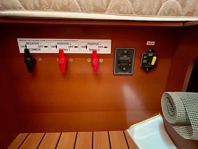 Slide: The Image of Battery control panel on a 2007 Beneteau 373 sailboat interior. - 26