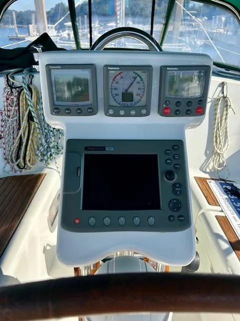 Slide: The Image of Beneteau 373 sailboat cockpit with navigation instruments, 2007 model. - 29