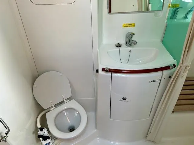 Slide: The Image of Beneteau 373 2007 yacht bathroom with sink and toilet. - 8