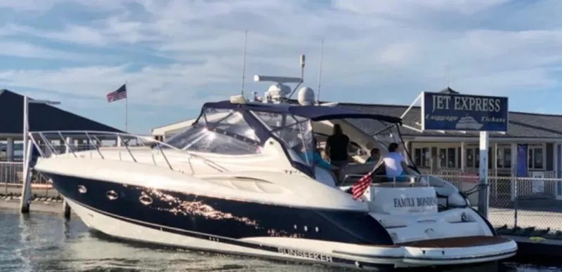 The Image of 2001 Sunseeker Camargue 44 yacht docked near Jet Express terminal. - 0