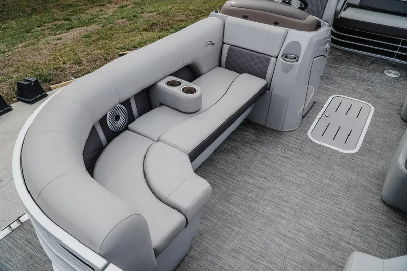 Slide: The Image of Luxurious seating on 2021 Bennington 22SSBXP pontoon boat with cup holders and modern design. - 13
