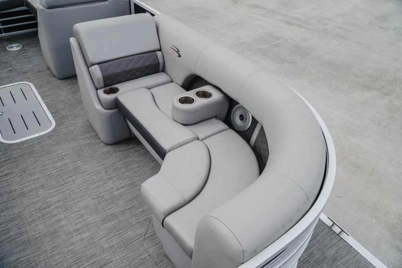 Slide: The Image of Luxurious seating on a 2021 Bennington 22SSBXP pontoon boat with cup holders and fan. - 14