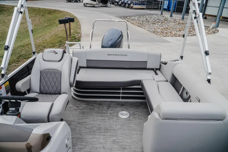 Slide: The Image of 2021 Bennington 22SSBXP pontoon boat interior with luxurious seating and modern design. - 15