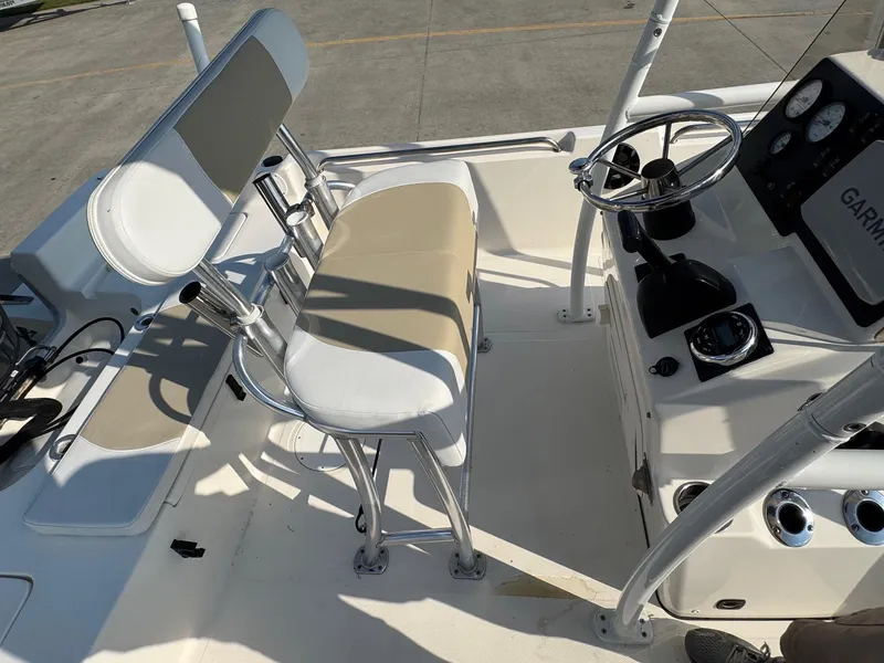 Slide: The Image of 2019 Bulls Bay 2000 boat interior with steering wheel and seating. - 16