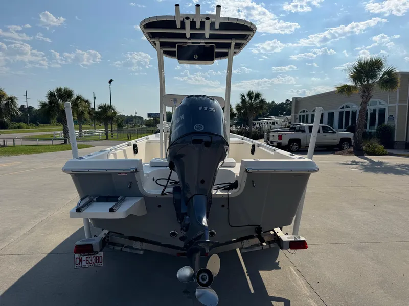 Slide: The Image of 2019 Bulls Bay 2000 boat with Yamaha outboard motor, parked outdoors on a sunny day. - 3
