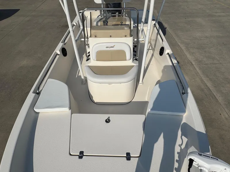 Slide: The Image of 2019 Bulls Bay 2000 boat interior with seating and Minn Kota trolling motor. - 6