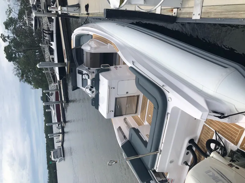 Slide: The Image of 2025 Zar Formenti 85 SL boat docked at a marina. - 10