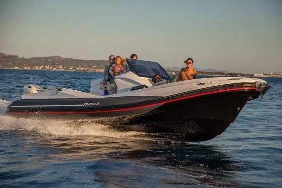 Slide: The Image of 2025 Zar Formenti 85 SL speedboat cruising on open water with passengers. - 14