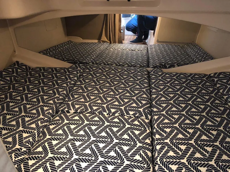 Slide: The Image of 2007 Grady-White Express 330 cabin interior with patterned cushions. - 22