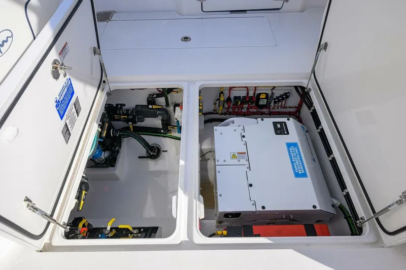 Slide: The Image of 2025 Valhalla Boatworks V-41 engine compartment showcasing advanced mechanical systems. - 19