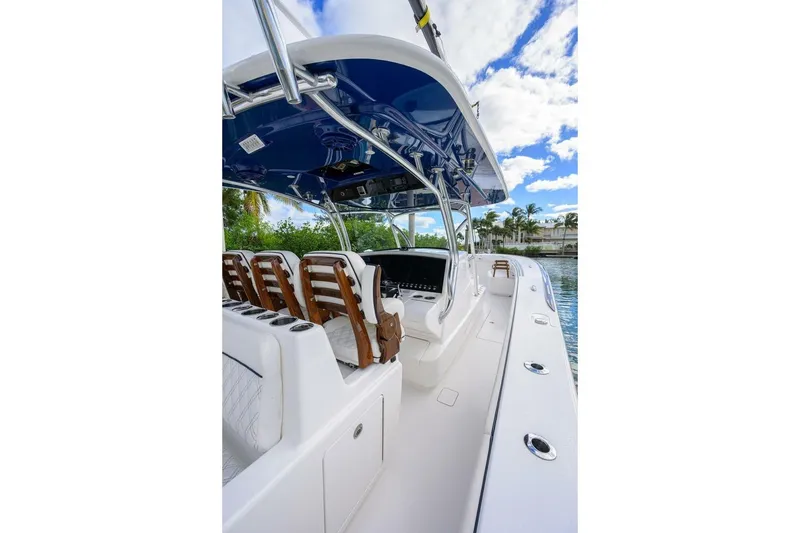 Slide: The Image of 2025 Valhalla Boatworks V-41 interior with sleek seating and modern helm design. - 26