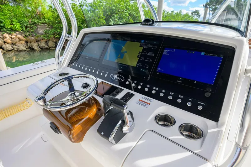 Slide: The Image of 2025 Valhalla Boatworks V-41 helm with advanced navigation displays and controls. - 29