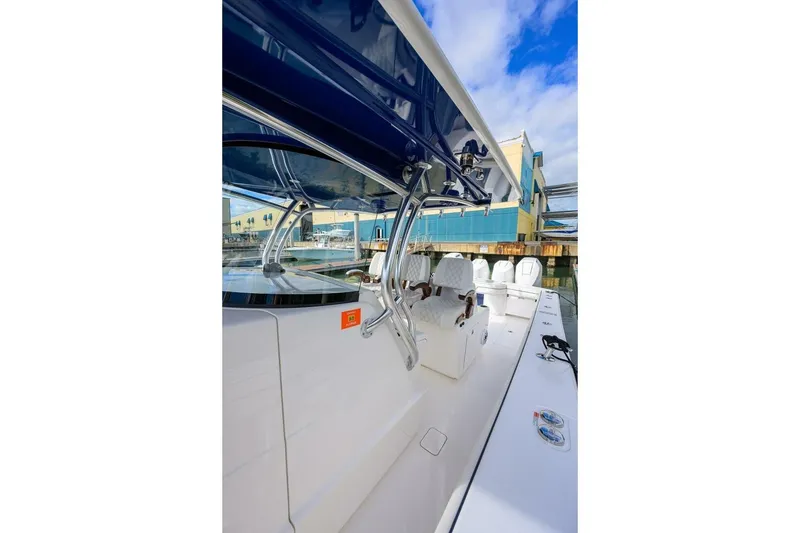 Slide: The Image of 2025 Valhalla Boatworks V-41, sleek interior view with modern seating and canopy. - 33