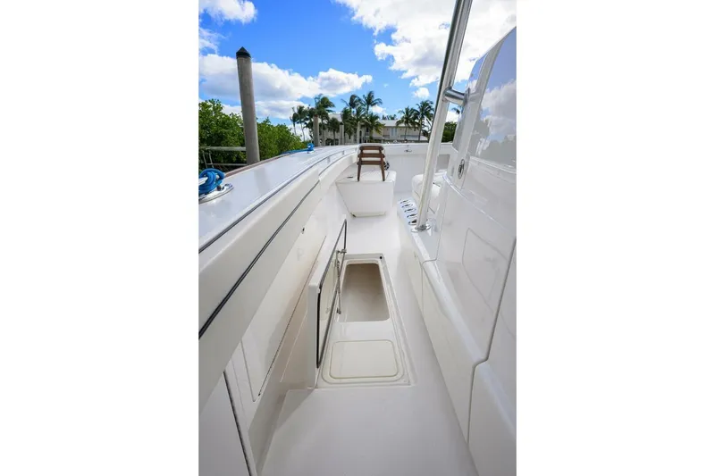 Slide: The Image of 2025 Valhalla Boatworks V-41 deck view with open storage compartment. - 34